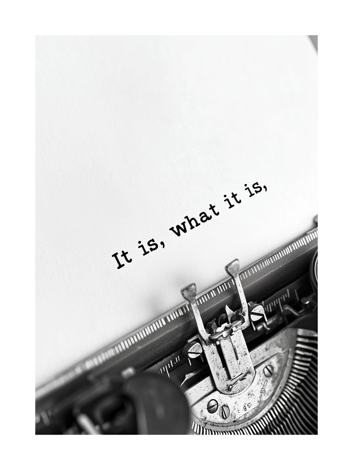 Black and white quote poster with 'It is what it is' typed on a typewriter