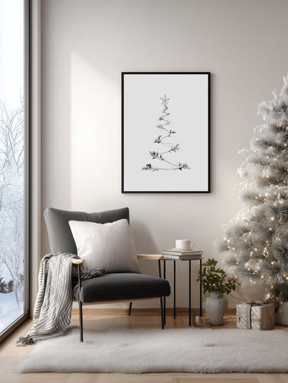 Modern living room with a Christmas tree, chair, and framed artwork on the wall.