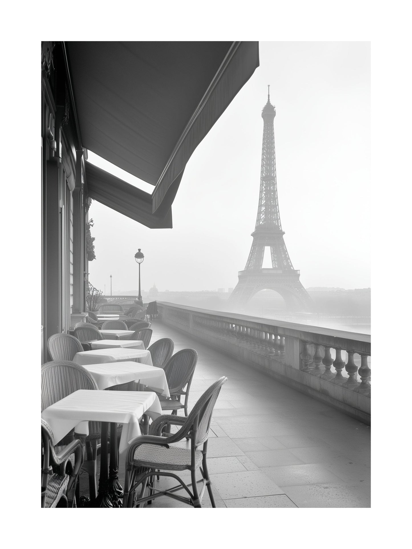 Black and white view of Eiffel Tower from a Paris café balcony