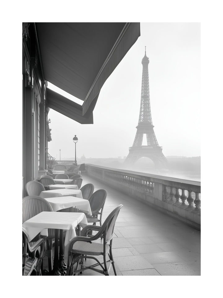 Black and white view of Eiffel Tower from a Paris café balcony