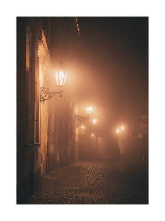 Halloween poster of foggy street with glowing lanterns