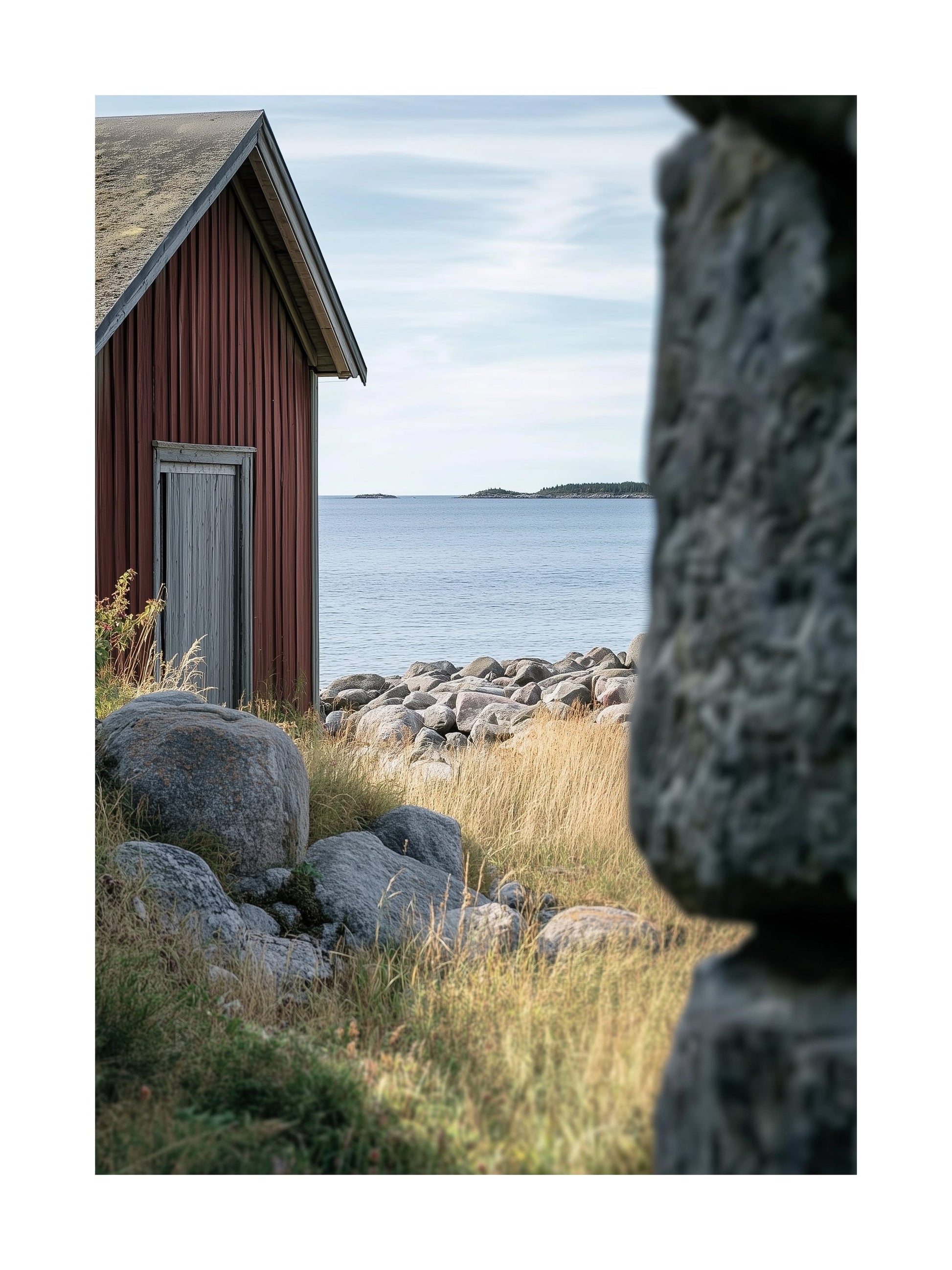 Poster of a rustic Swedish coastal hut surrounded by rocks and grass