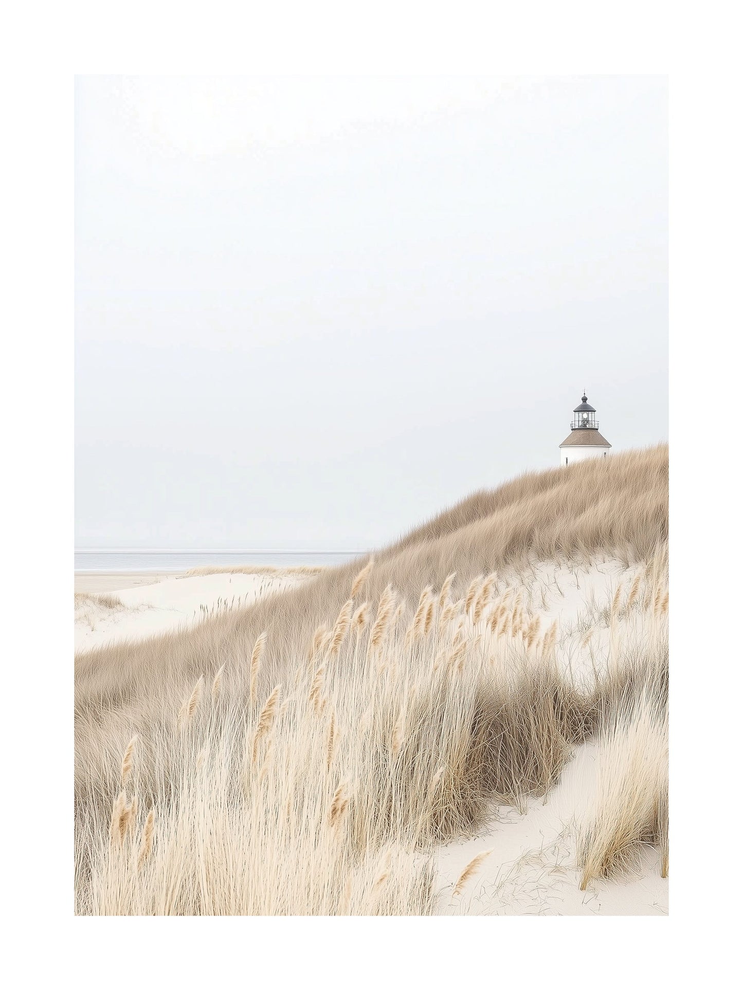 Lighthouse surrounded by beige dune grasses under a muted sky