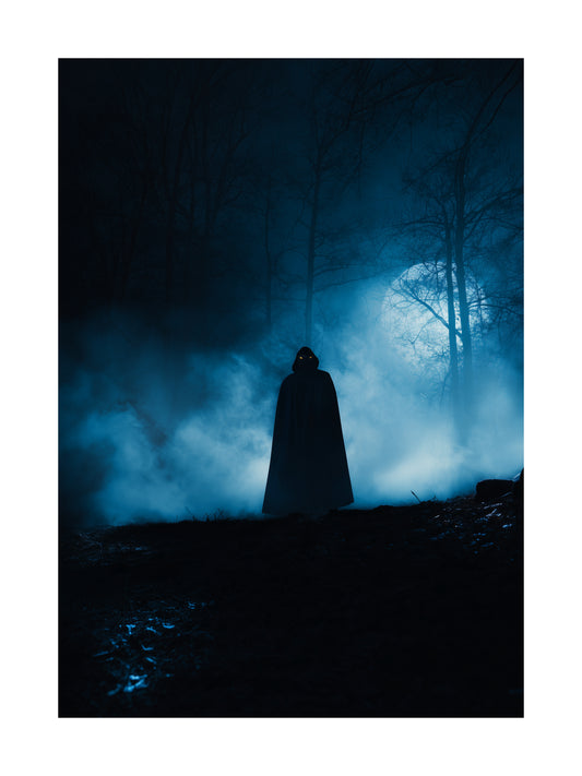 Mysterious hooded figure in foggy forest Halloween poster