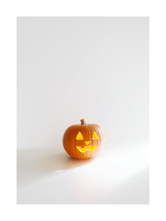 Minimalist Halloween poster with glowing carved pumpkin on white background