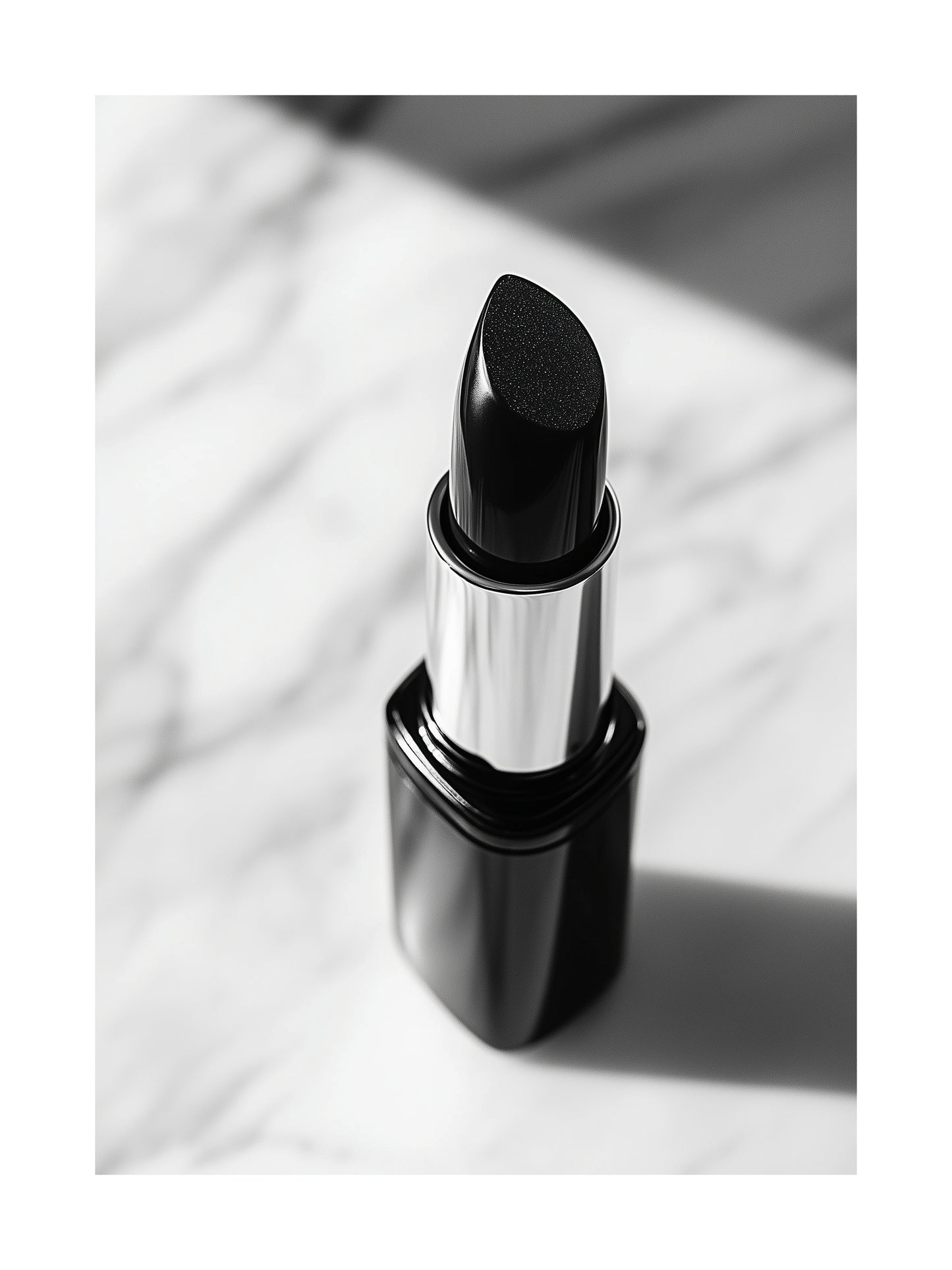 Black and white close-up of lipstick on marble – modern beauty poster