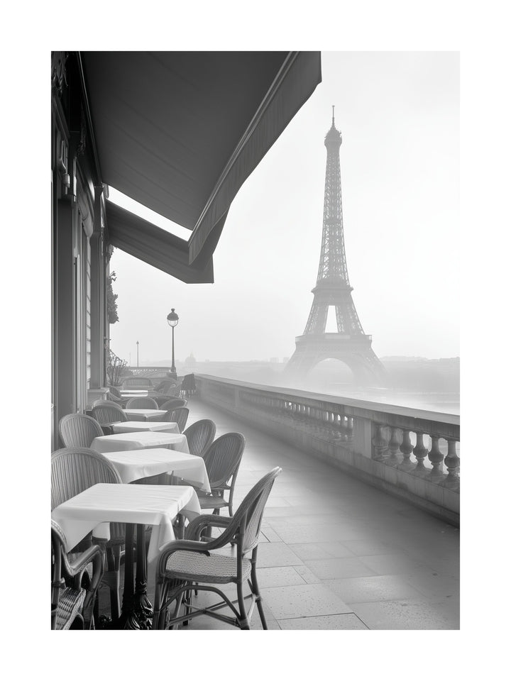 Black and white view of Eiffel Tower from a Paris café balcony