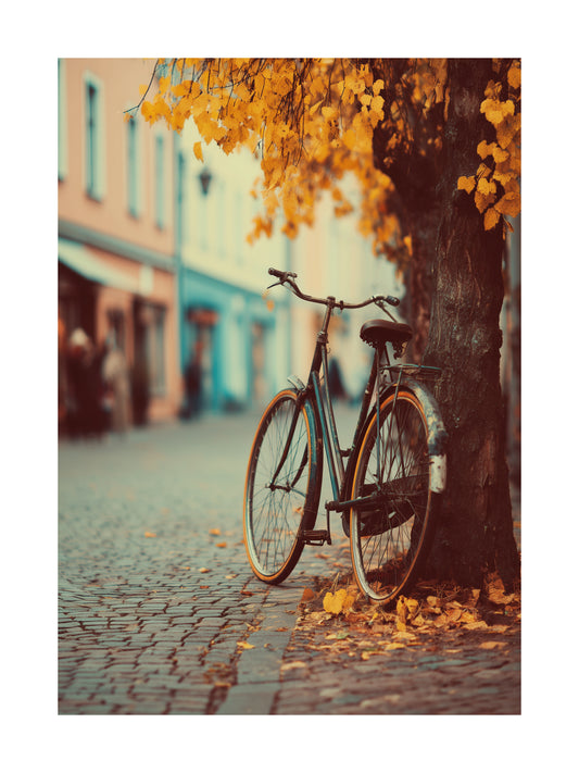 Poster of vintage bicycle under autumn tree on cobblestone street