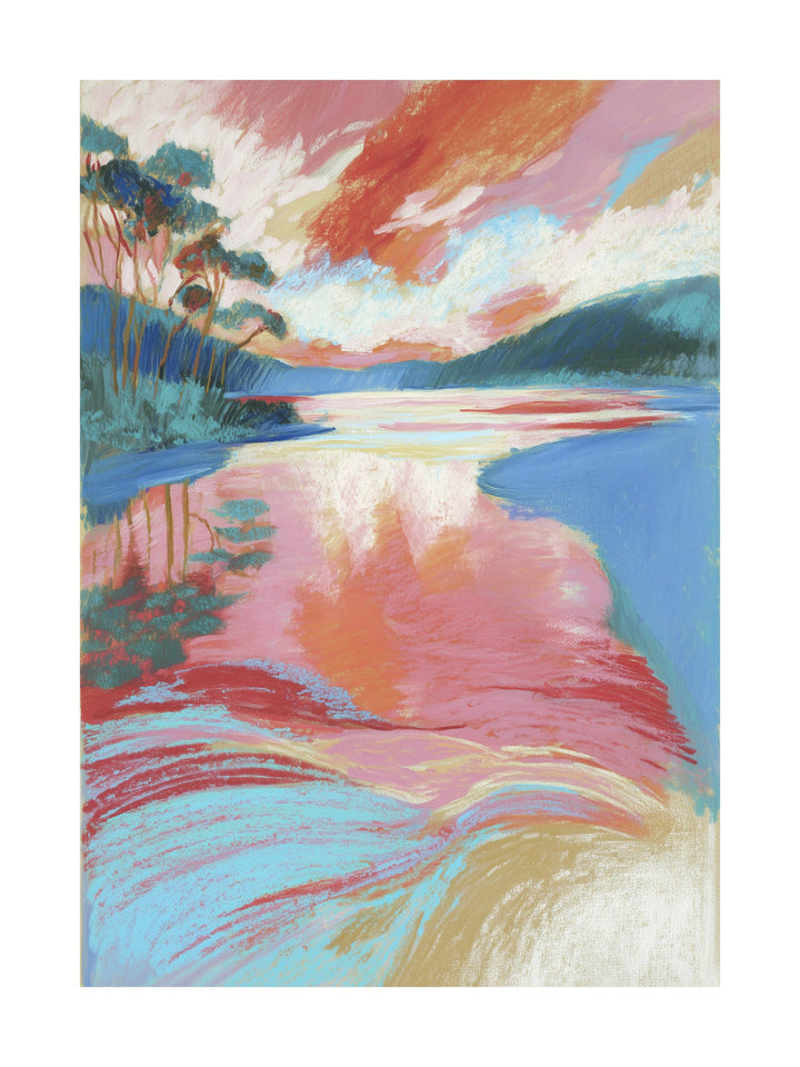 Lake reflecting vivid sunset and forest edge