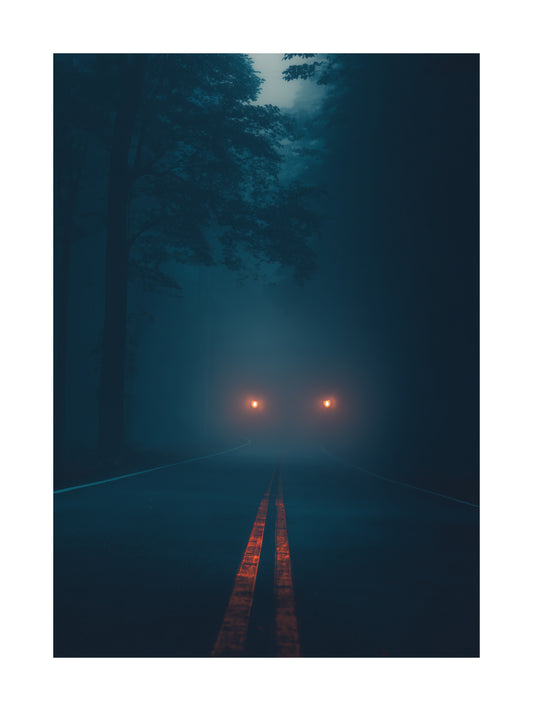 Poster of a dark foggy road with glowing headlights