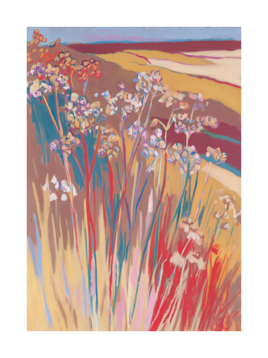 Colorful wildflowers in golden meadow landscape