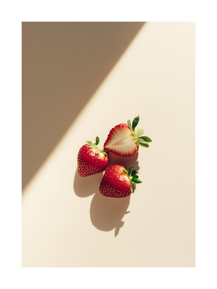 Poster of fresh strawberries and shadows on a light background